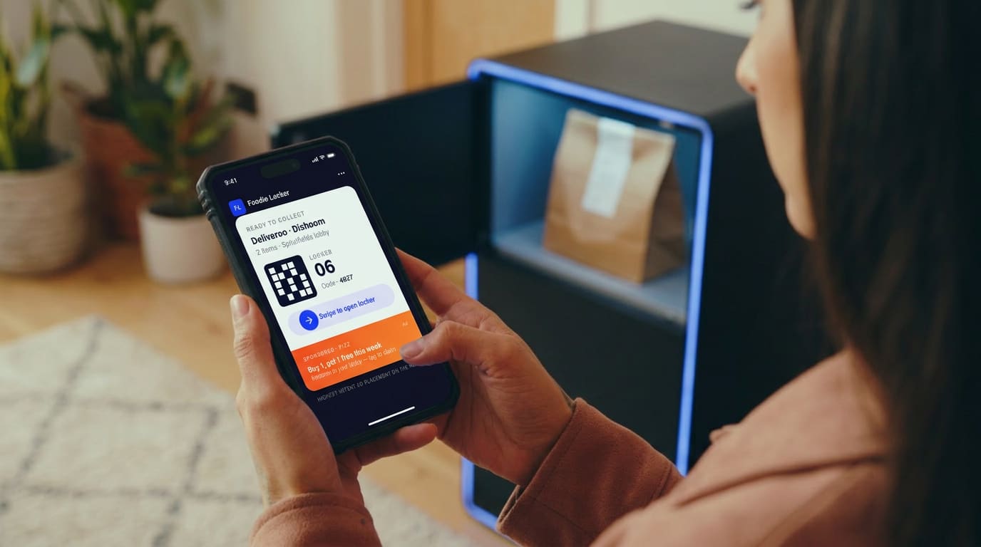 Resident collecting hot takeaway food contactlessly from a smart locker